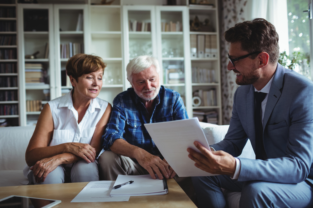 Elderly couple consults with a Helena, MT elderly caregiver services provider