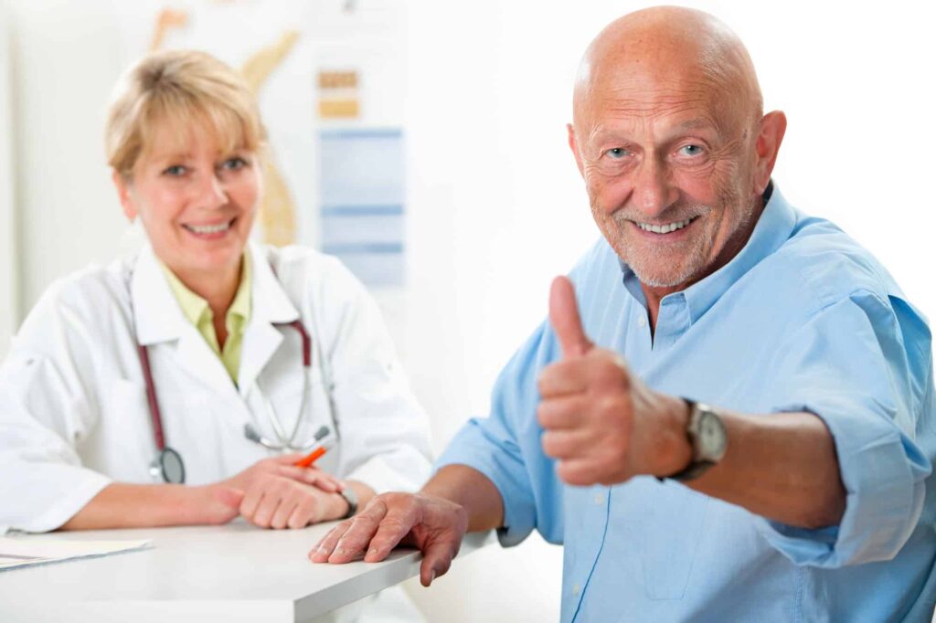 Man talking to a Helena, MT senior home health care provider and giving a thumbs up